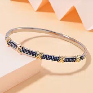 Simulated Blue Diamond 10.00 ctw XOXO Bangle Bracelet in Dualtone